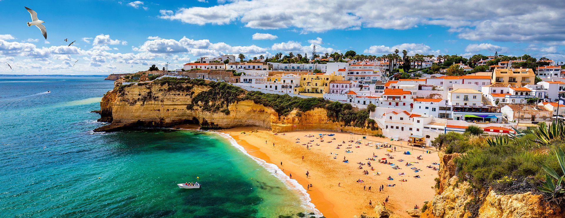 View of Carvoeiro fishing village with beautiful beach, Algarve,