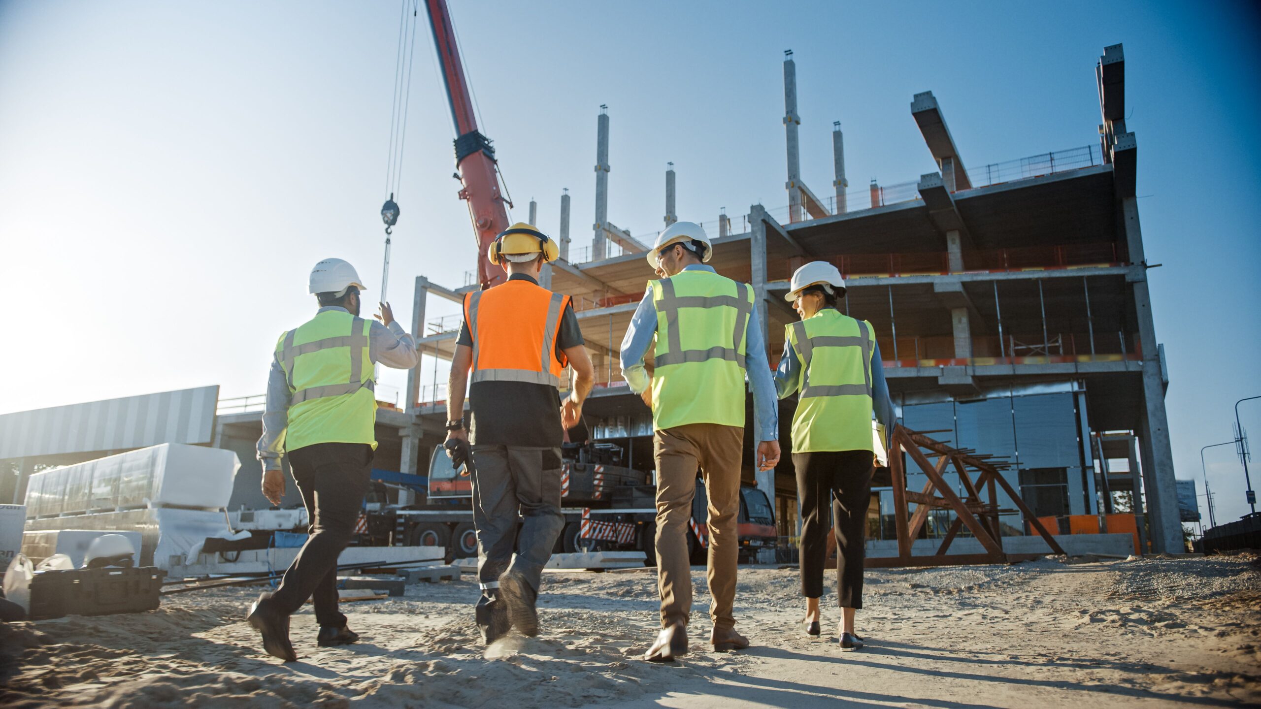 Diverse Team of Specialists Inspect Commercial